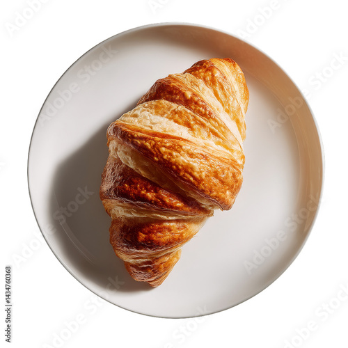 Buttery croissant pastry presented on a plate in an isolated overhead food shot