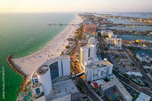 Clearwater Beach FL. Panorama of city. Summer vacations in Florida. Beautiful View on Hotels and Resorts on Island. Green color of sea water. Gulf of Mexico. Gulf of America. View of beautiful ocean