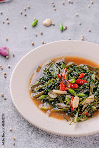 A plate of food with a sauce on it