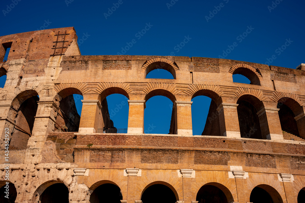 Obraz premium The Colosseum is an elliptical amphitheatre in the centre of the city of Rome, Italy, just east of the Roman Forum. It is the largest ancient amphitheatre ever built, and is still the largest standing