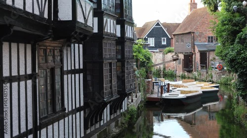 View Of A Canal With Old Houses And Boats In A European City (Canterbury, UK)
