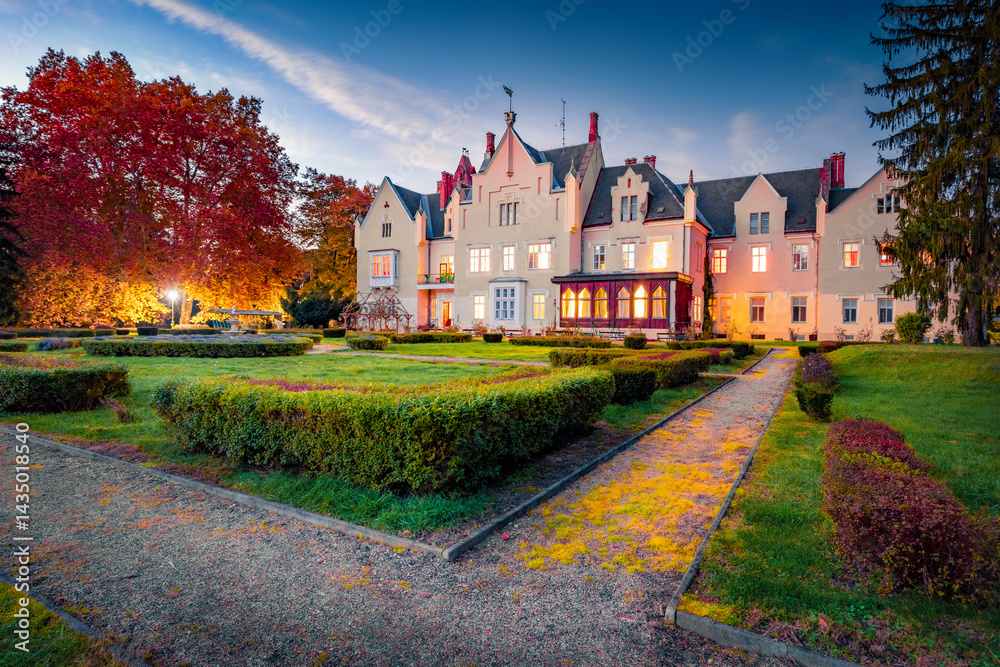 Splendid evening view of Festetics Castle - Szombathely Home for the Elderly. Adorable autumn cityscape of Szombathely town, Hungary, Europe. Colorful sunset in Hungarian countryside.