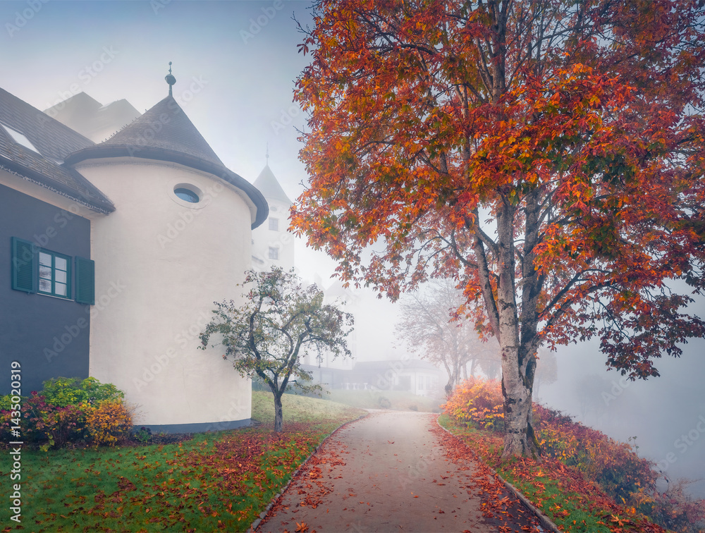 Astonishing morning view of Pichlarn Castle, situated on an elevation in the Ennstal valley in Styria, at the foot of the Grimming mountain massif. Nice autumn cityscape of Pichlarn resort, Austria.