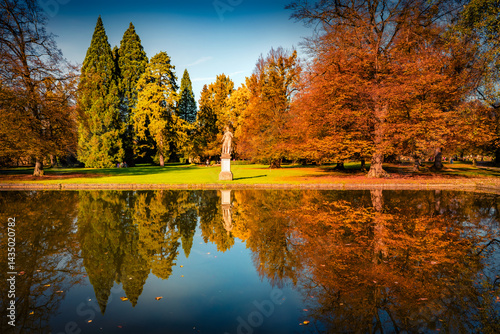 Obraz na płótnie Calm autumn scene of Hellbrunn castle garden, Austria, Europe. Picturesque morning view of Hellbrunn garden lake in outskirts of Salzburg city, Austria, Europe. Beauty of nature concept background.. w salonie