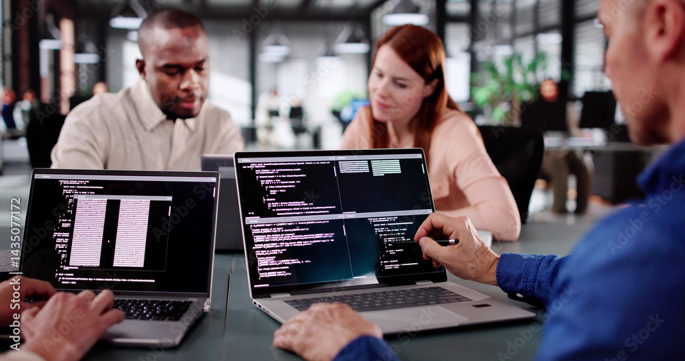 Programmers Collaborate In A Modern Office