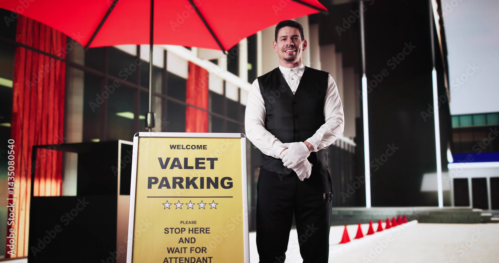 The Professional Valet: A Young Man In Uniform Promoting Valet Parking Service