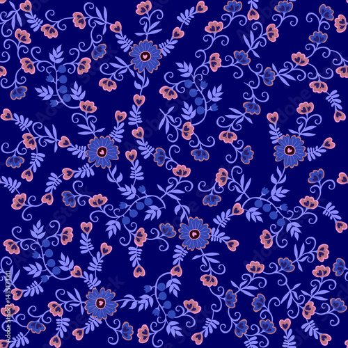 Seamless pattern with blue and pink flowers on a deep blue background. Beautiful print for fabric in folk style.