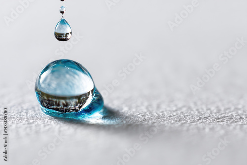 Water Drop on White Background photo