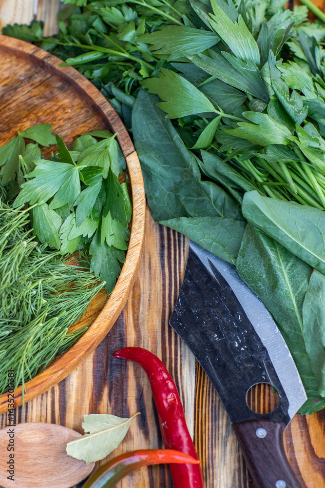 fresh greens from the garden, prepared for summer salad in the country.