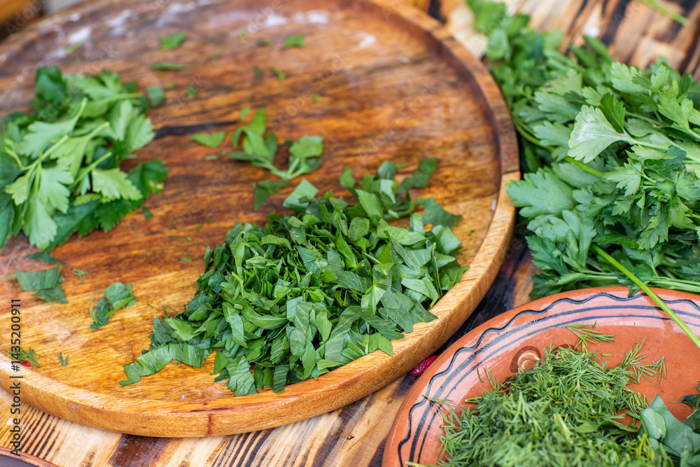 fresh greens from the garden, prepared for summer salad in the country.