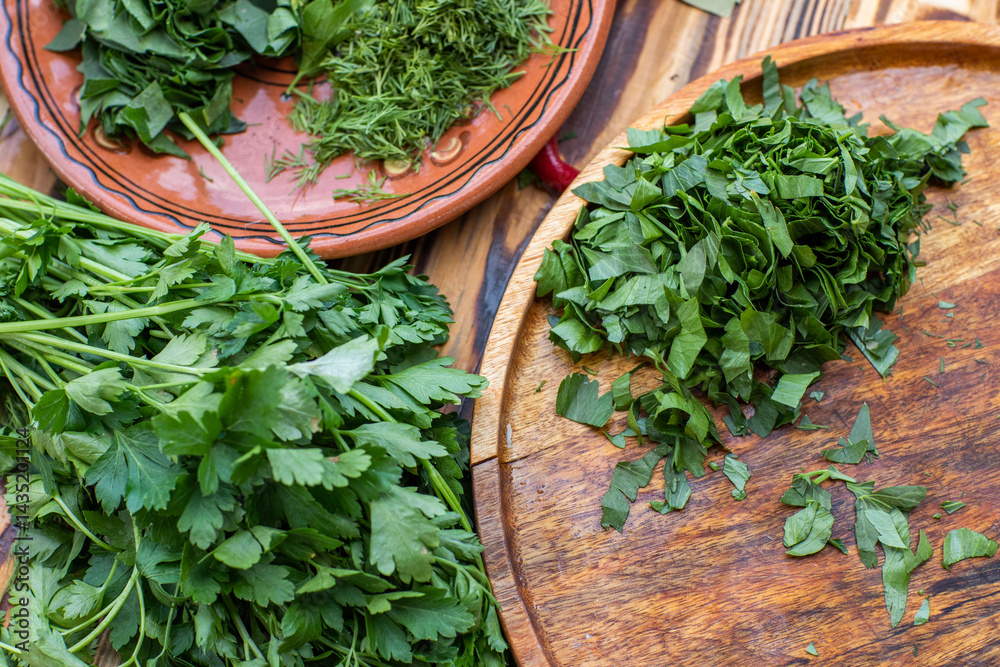 fresh greens from the garden, prepared for summer salad in the country.