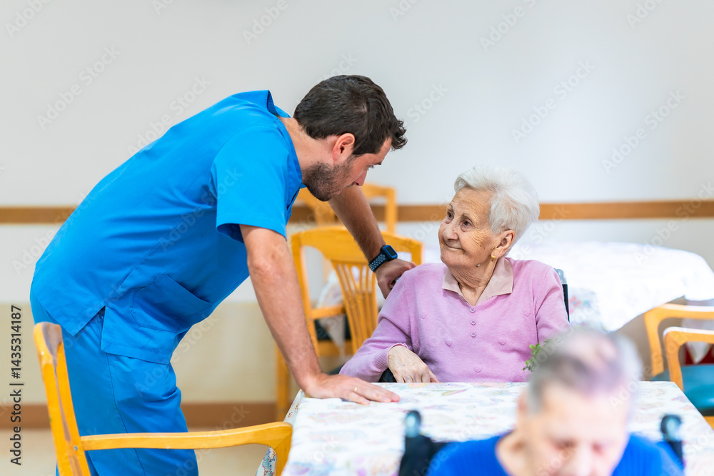Male nurse assisting elderly woman in nursing home