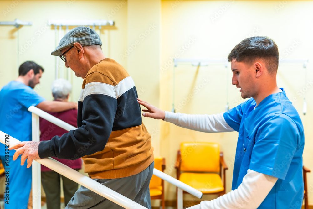 Nurse assisting elderly man using parallel bars in nursing home