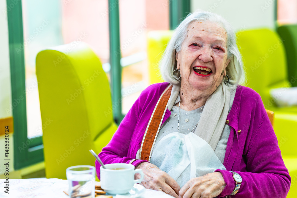Happy senior woman smiling in nursing home