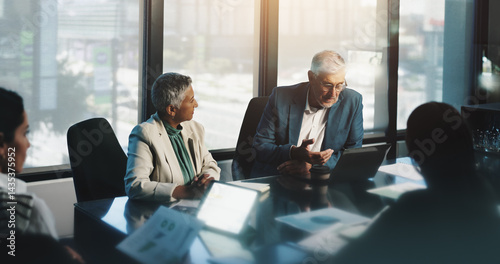 Meeting, collaboration and people with laptop, boardroom and discussion for stats, team and company. Corporate, colleagues and analysis of charts in business, planning and communication for updates