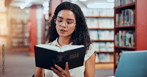 Obraz na płótnie Woman, bible study and reading at library for learning for theology assessment at university