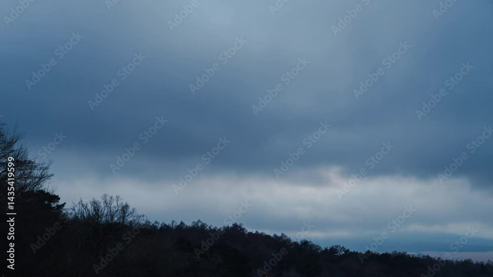 4K time lapse of clouds passing through clouds with mountain fuji in Japan.