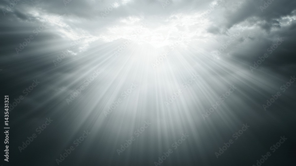 Fototapeta premium A dramatic sky with dark clouds and bright sunlight.