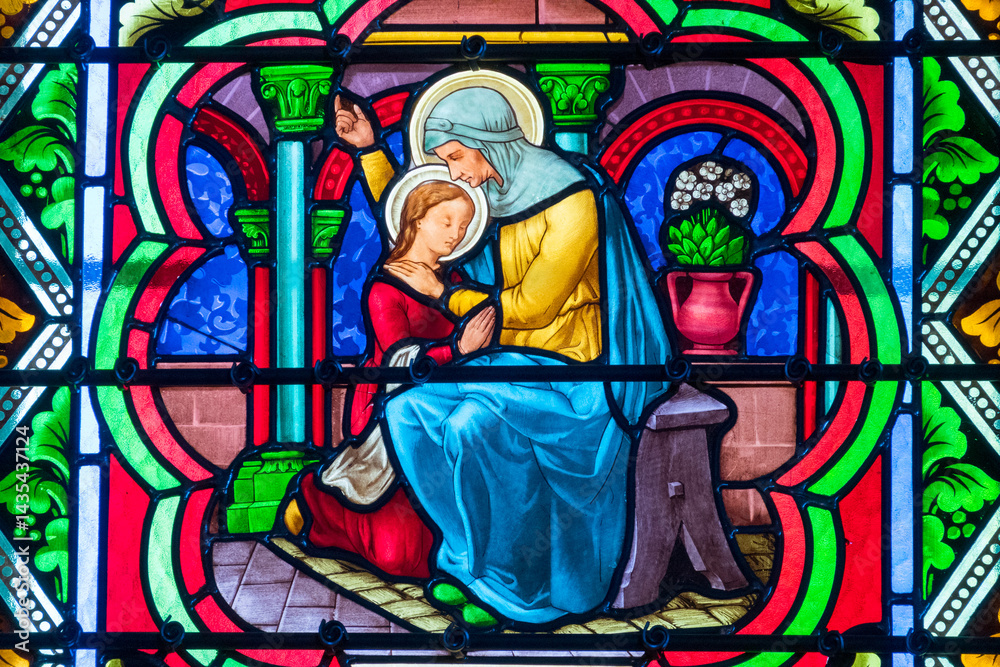 Obraz premium Stained glass (19th century) of Virgin Mary with her mother St. Anne.