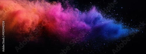 A vibrant explosion of color resembling a powder burst against a dark background.