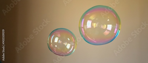 Floating soap bubble captured mid frame against beige wall Fragility, reflecti