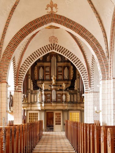 Interior of St Nicholas Church in Burg auf Fehmarn, Schleswig-Holstein, Germany, hall church with arches and organ