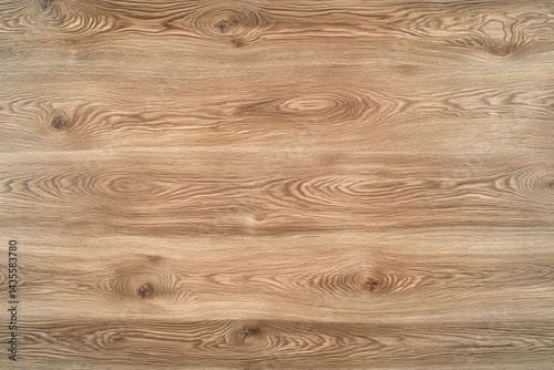 Natural wood grain floor.  Close-up view of a light brown hardwood floor, showing wood grain patterns, knots, and straight lines.  The surface appears smooth and even