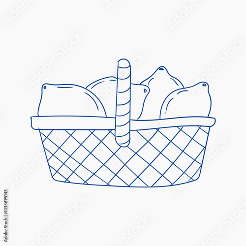 Fresh lemons in a woven basket placed on a light background for a bright, summery look