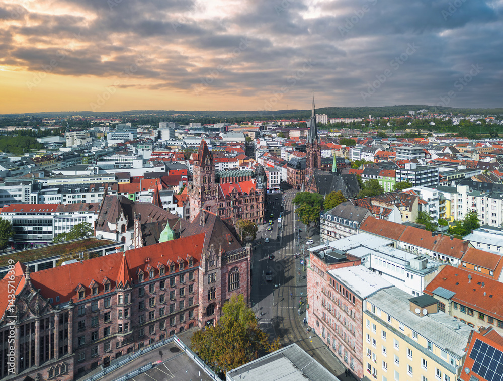 Summer cityscape of Saarbrücken, Germany. Aerial view of the city center with Rathaus (Town hall) at sunset