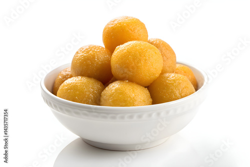 A white bowl of ladoos on pure white background.
