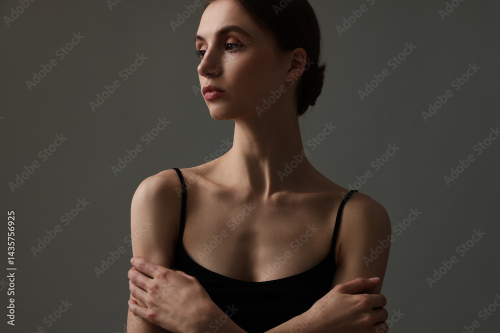 Fototapeta premium Woman with perfect skin on grey background