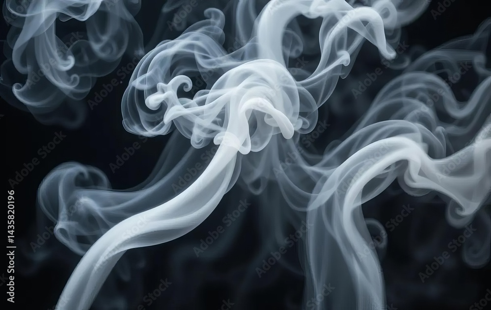 Fototapeta premium A photo of swirling smoke against a black background