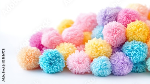 Colorful pom-poms in a variety of pastel shades, creating a cheerful and vibrant display