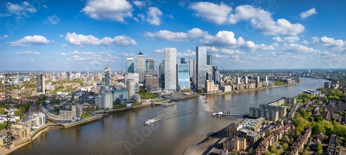 Obraz na płótnie Panoramic aerial view of district Canary Wharf and the Docklands in London, England, during a sunny day w salonie