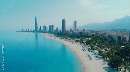 Aerial View of Modern City Skyline Along Serene Beach