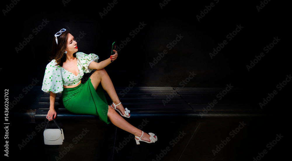 attractive female reacts to a text message. High quality photo