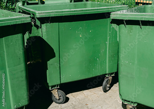 Large Green Garbage Bins in the City – Waste Management and Recycling Challenges photo