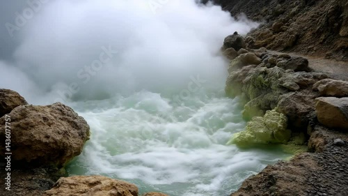 Geothermal hot spring surrounded by large rocks and dense vapor, bubbling water surface, scenic landscape, natural wonder, volcanic activity, tourism
