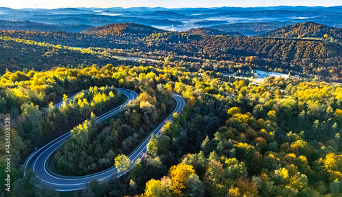 Fototapeta Naklejka Na Ścianę i Meble -  Serpentine road in Slonne Mountains near Sanok, Poland