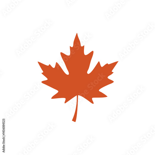 Orange maple leaf resting on a plain background symbolizes autumn and Canadian culture in natural color