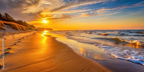 Fototapeta Naklejka Na Ścianę i Meble -  Amber glow on sandy beach by Baltic Sea at sunset, ocean views, outdoor,  ocean views, outdoor, water, sunset