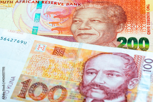 200 South Africa rand and 100 Croatian kuna banknotes. International trade concept