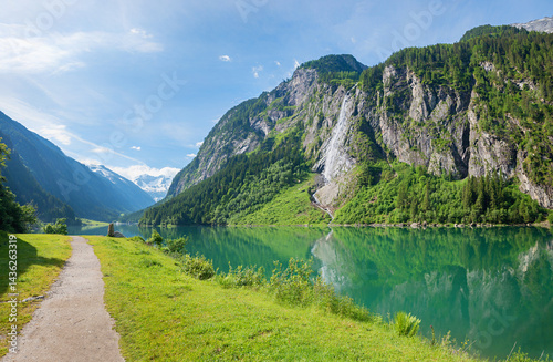 Obraz na płótnie walkway along artificial lake Stillupspeicher, green spring landscape tyrol w salonie