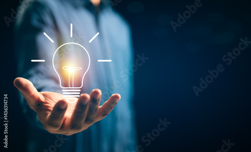 Businessman hands showing light bulb for thinking new idea concept. Innovative technology with innovation. Inspiration of ideas for sustainable business development and communication concepts