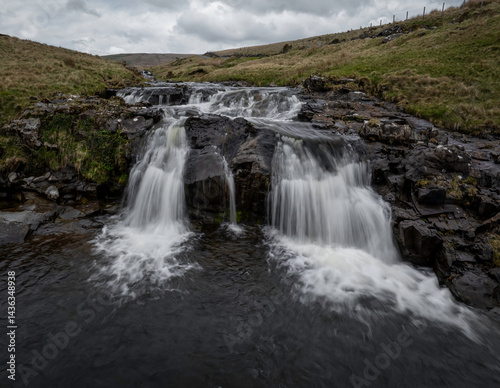 A small waterfall on the River Tawe quite close to its source alongside the old Trecastle road in the Brecon Beacons, South Wales.
