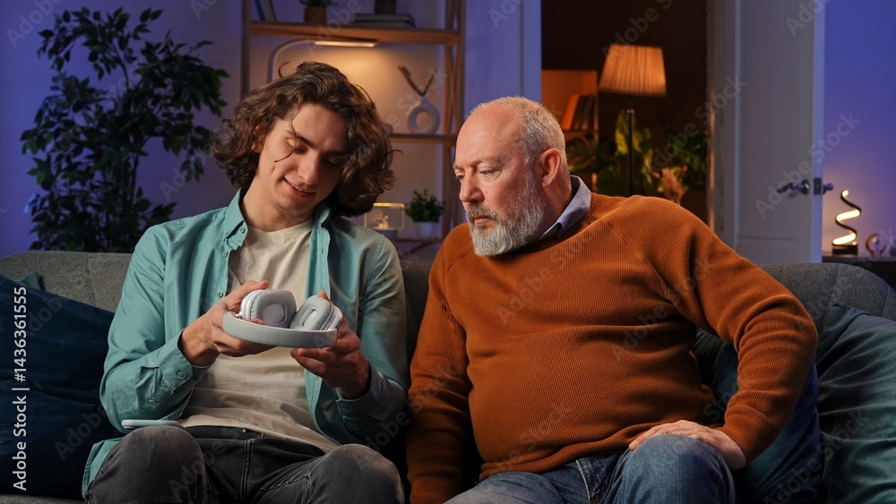 Fototapeta premium Intergenerational Knowledge Transfer Between Two Generations