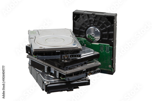 Stack of old hard disk drives and opened HDD case, isolated on transparent background.