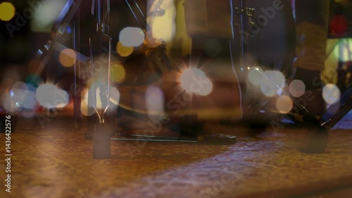 Boots pressing bass drum pedal over patterned rug in flat design scene, featuring glowing bokeh