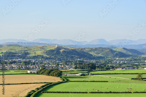 The view from Birkrigg across the town of Ulverston and the Cumbrian fells beyond