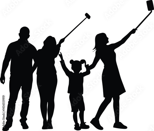 family taking selfie with selfie stick silhouette